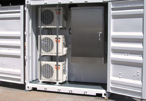 3 HVAC system with an electrical vault, its inside a white storage container.
